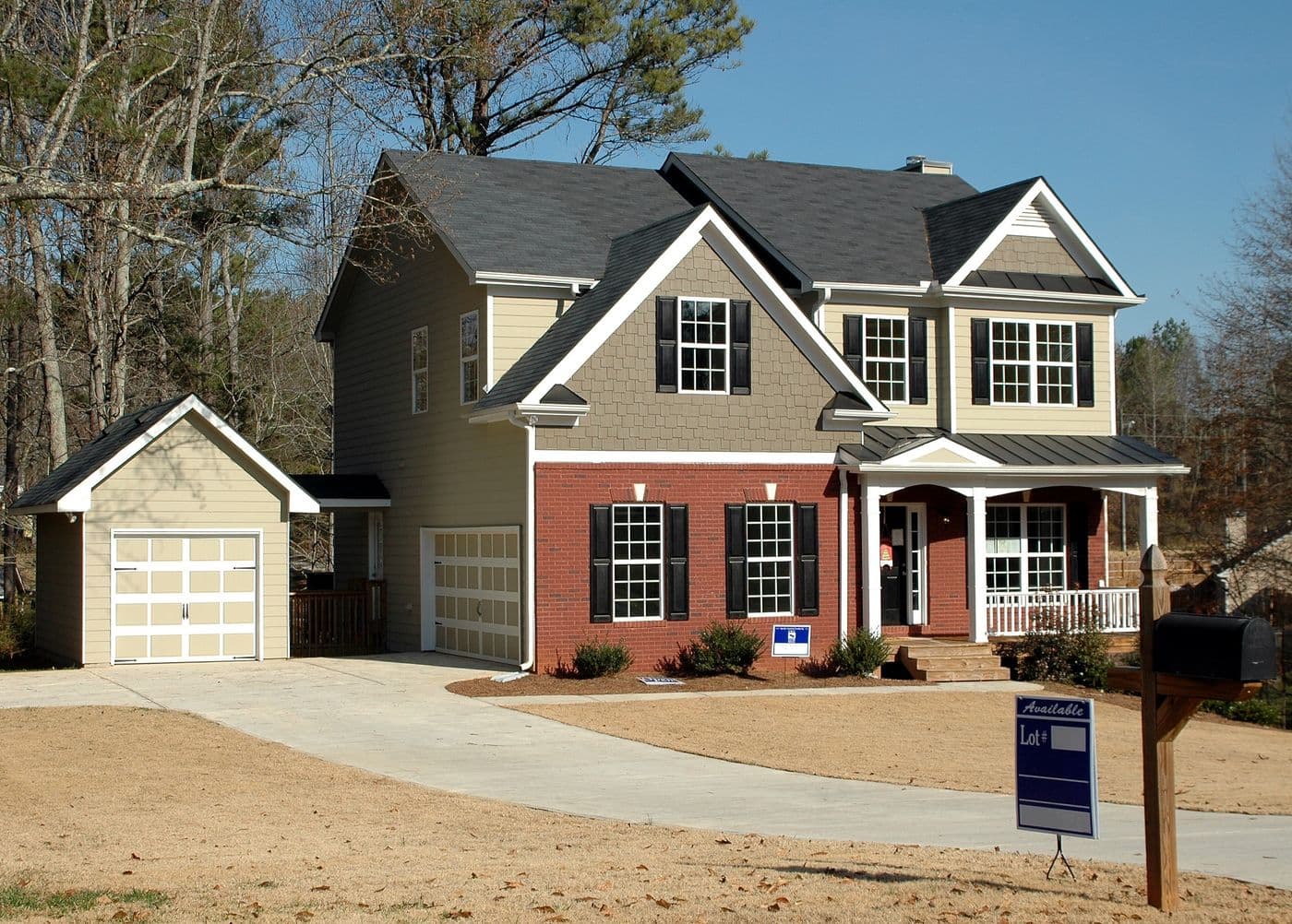 Gray colonial home on a suburban Massachusetts street